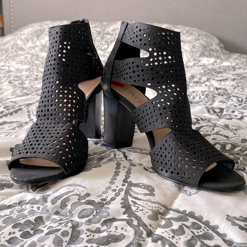 Women’s black heels.
